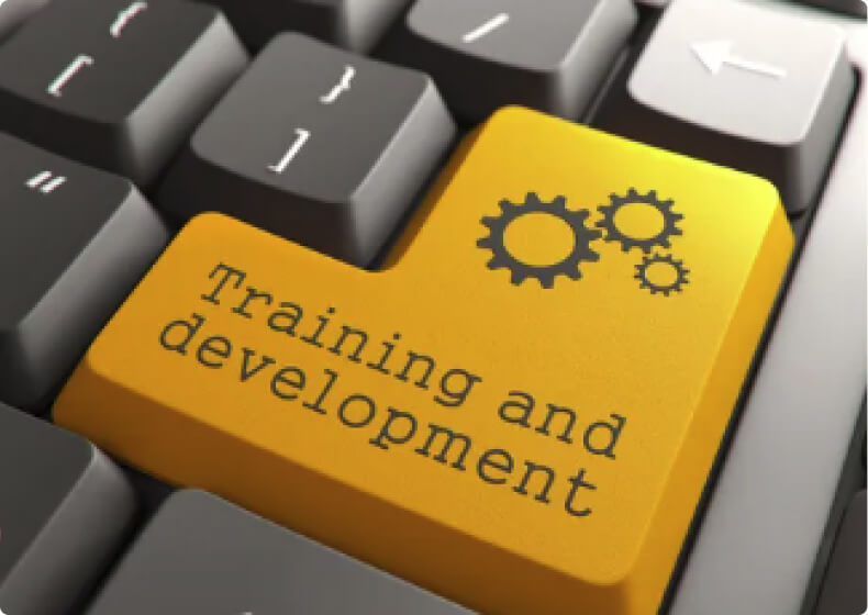 Photograph of Enter key saying Training and development
